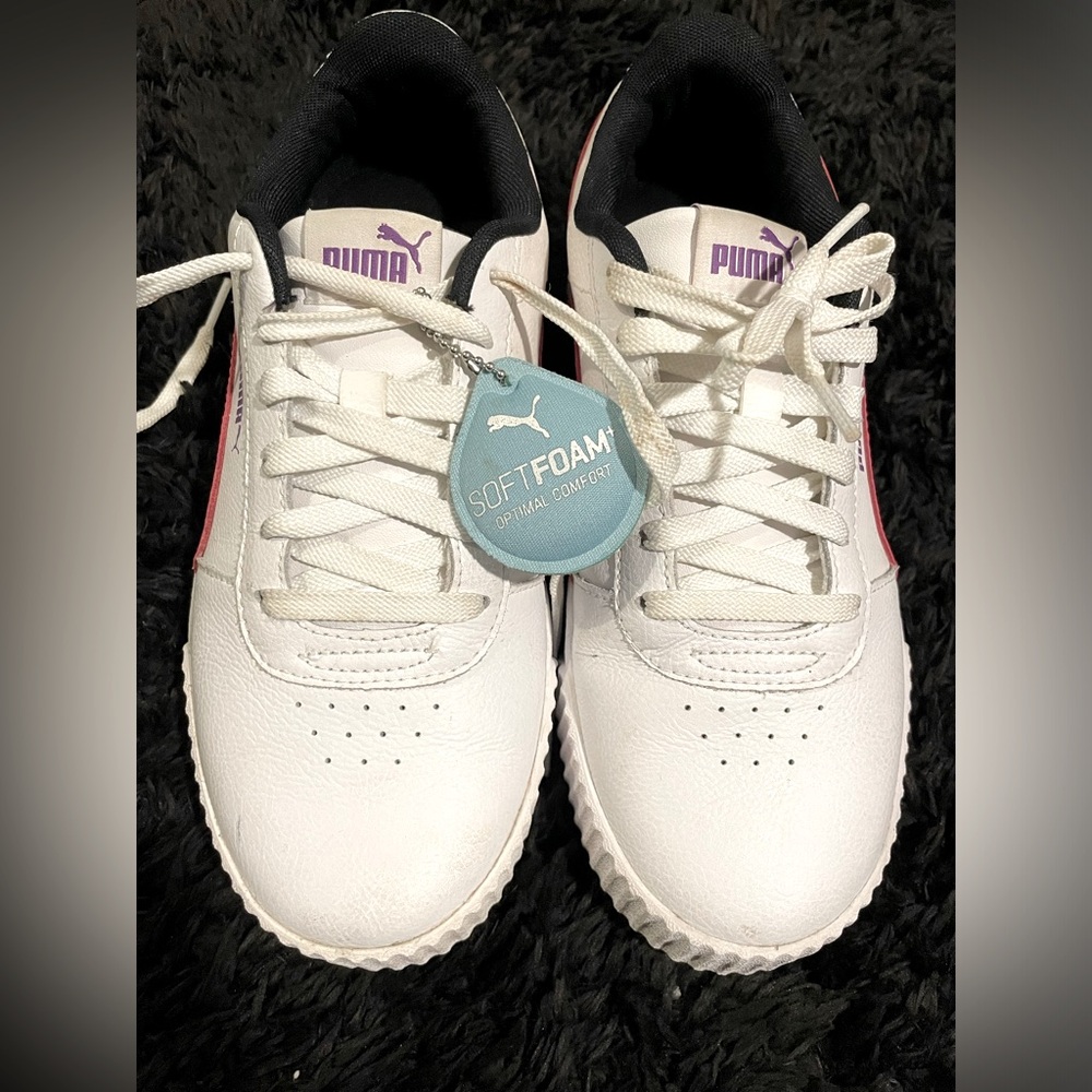 Puma white and pink soft foam trainers.